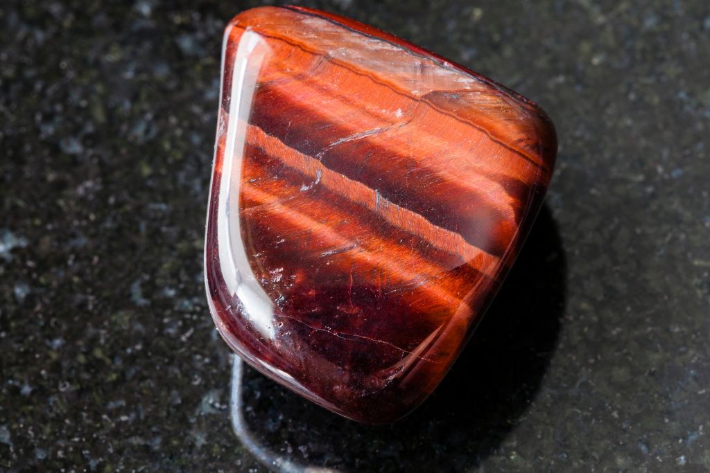 Ox's Eye(RedTiger Eye, Bulls Eye) on a black granite