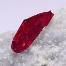 A Red Proustite on a crystal. Source: Etsy | ROCHARTS