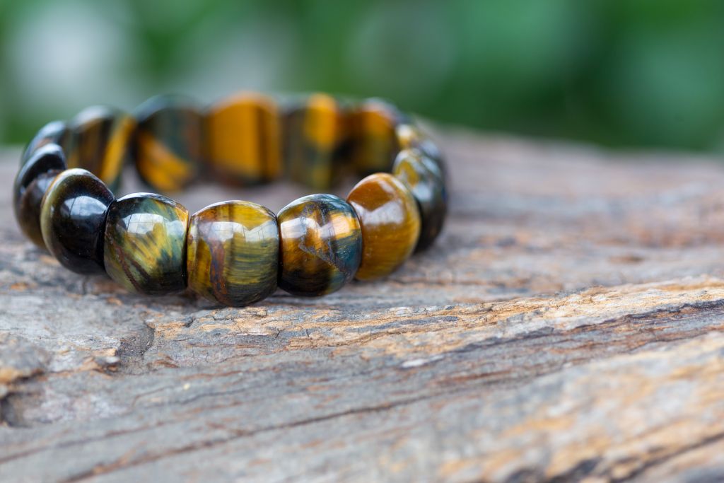 A tiger's eye bracelet on the table