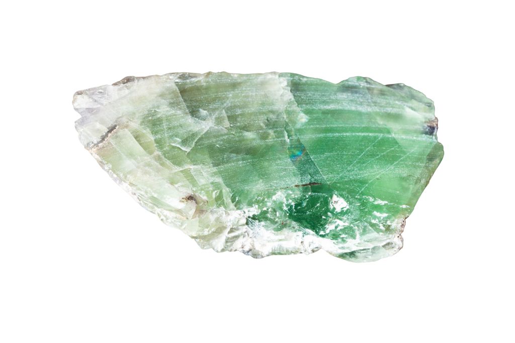 Green Chrysoberyl with edges in a white background 