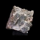 Clinozoisite crystal on a black background