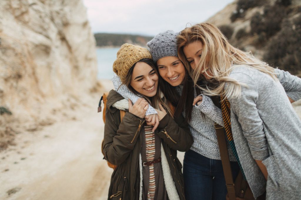 group of 3 girls who are close to each other