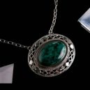 An Eilat Stone necklace on a black background, Source: Etsy | dimazjewelry