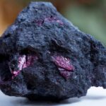 An Erythrite crystal on a table