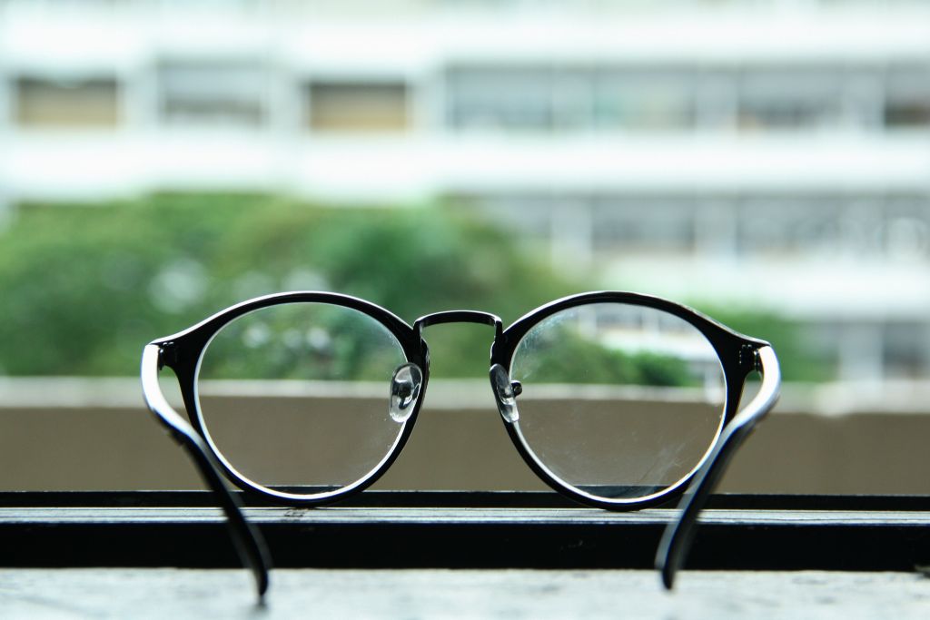 Eyeglasses at the window