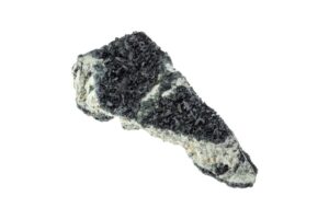 Hornblende crystal on rough amphibole rock