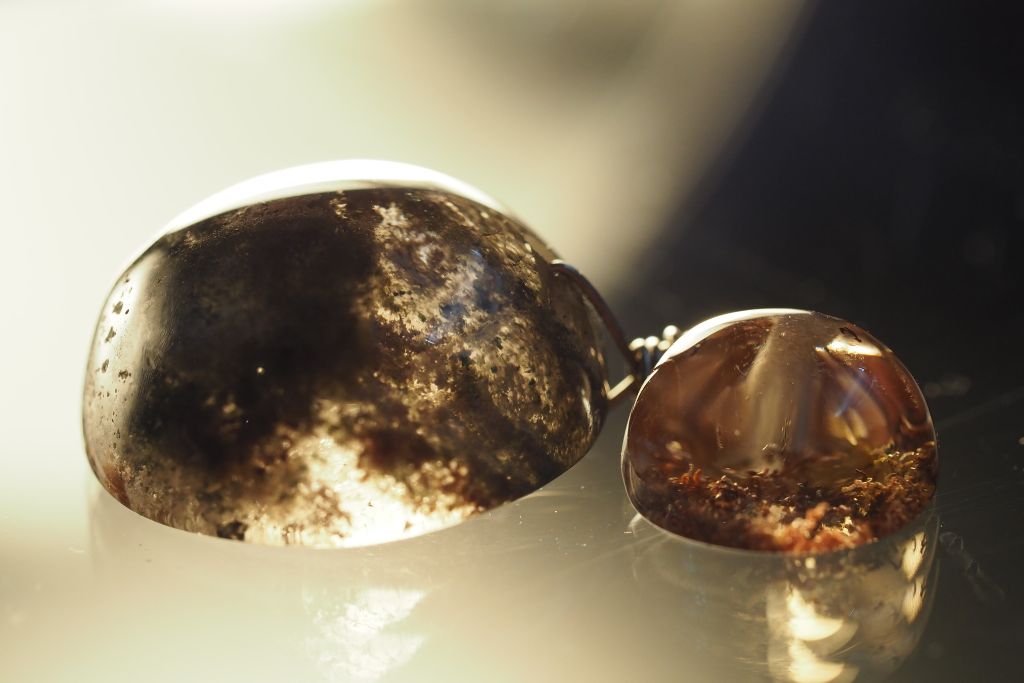 Lodolite aka Lodalite crystal on a brownish background