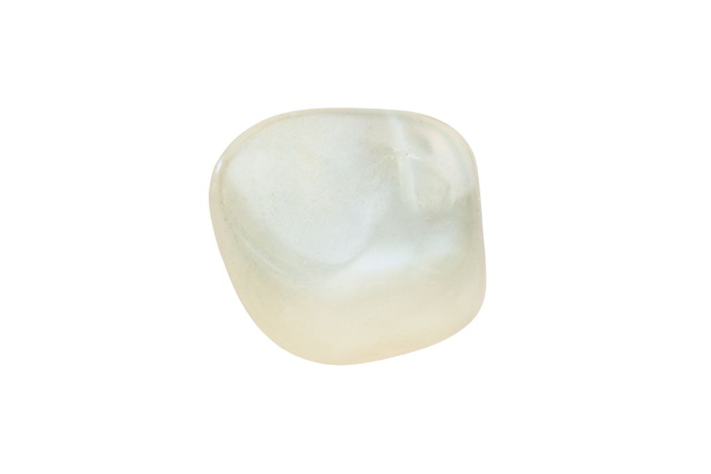 polished translucent Moonstone gemstone on a white background