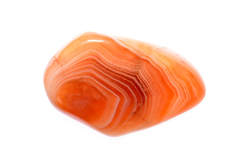 polished red agate on a white background