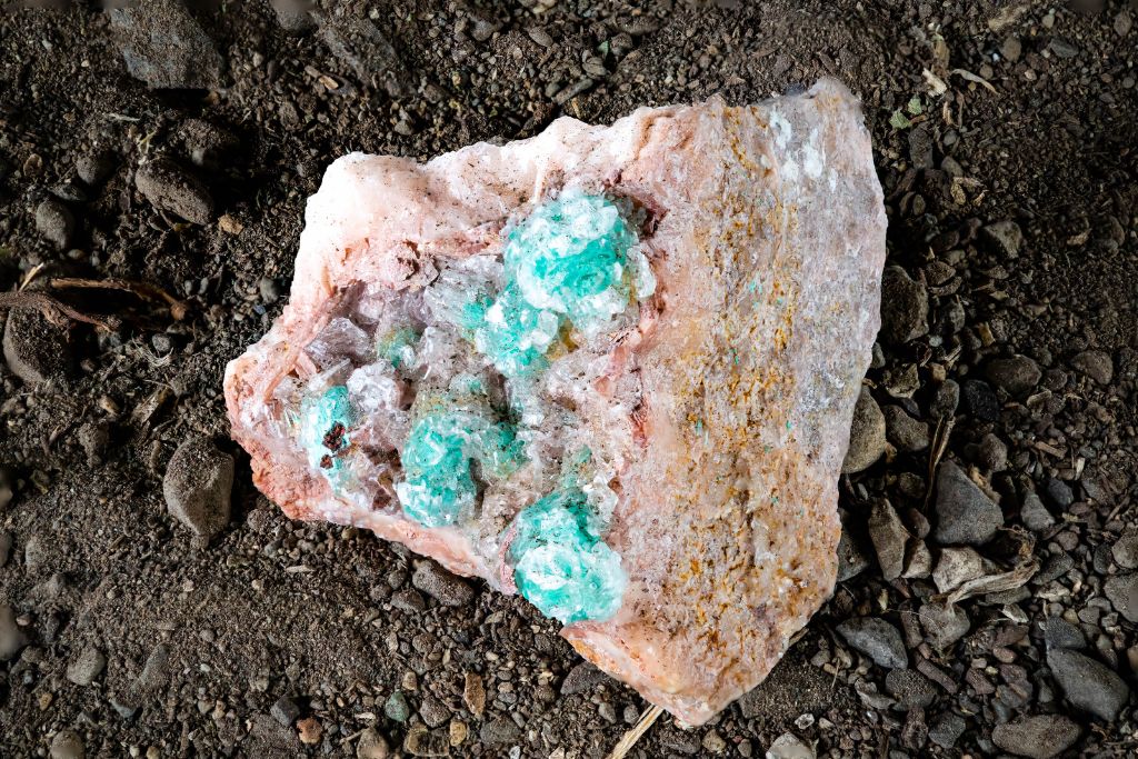 A Rosasite crystal on the soil