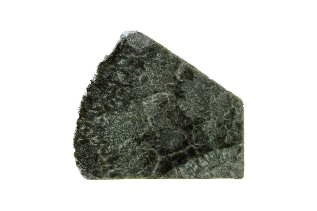 A Seraphinite crystal on a white background