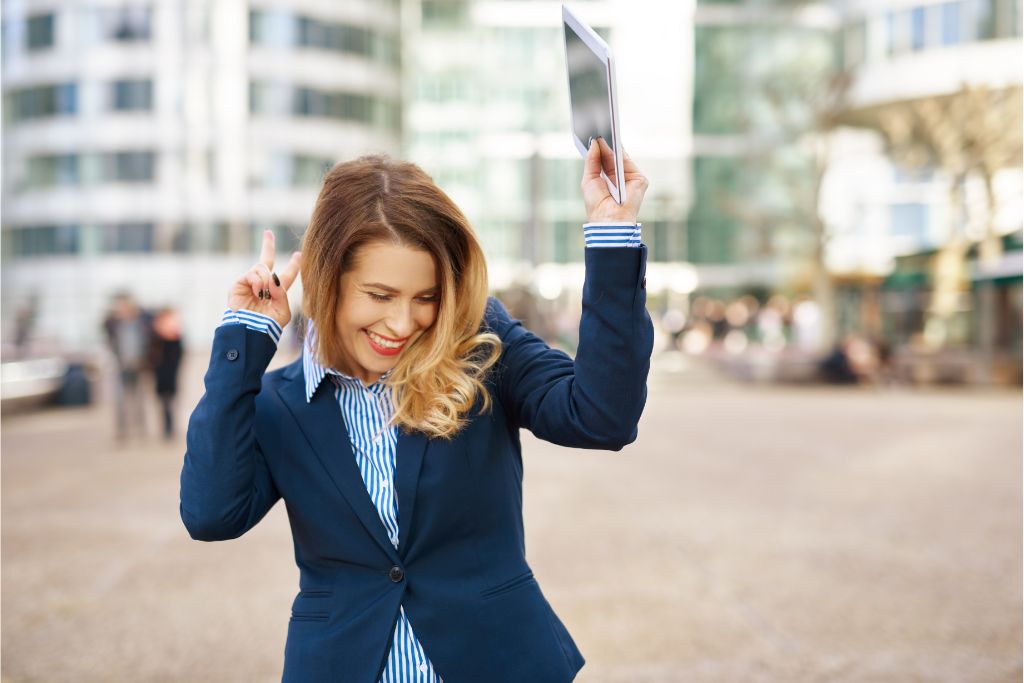 a happy and dancing woman