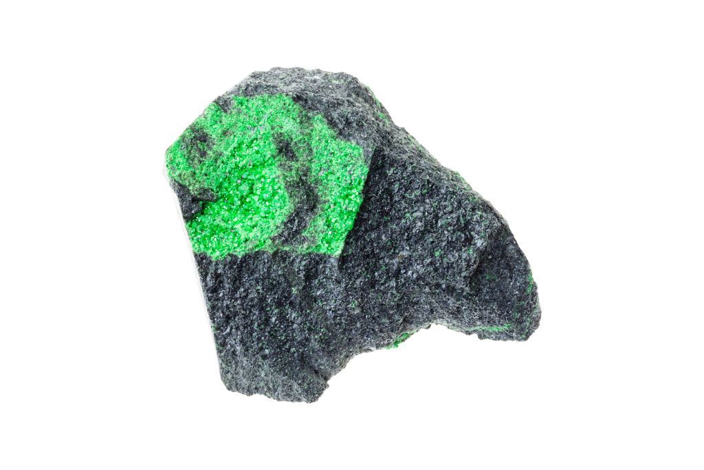A Uvarovite Garnet on a rock