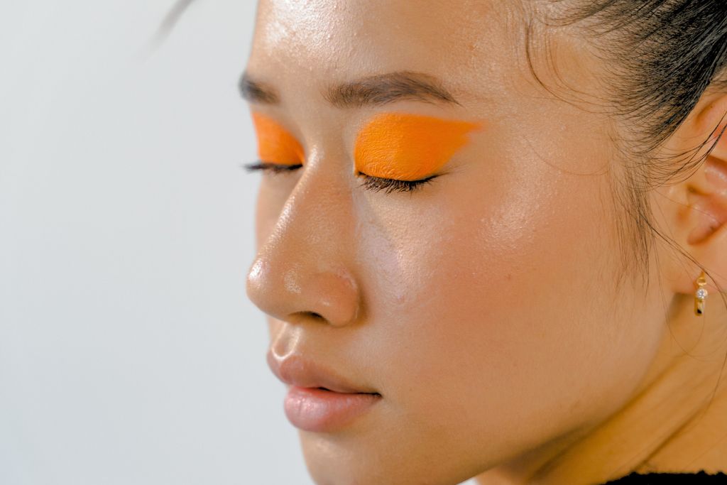 orange eye shadow of a woman