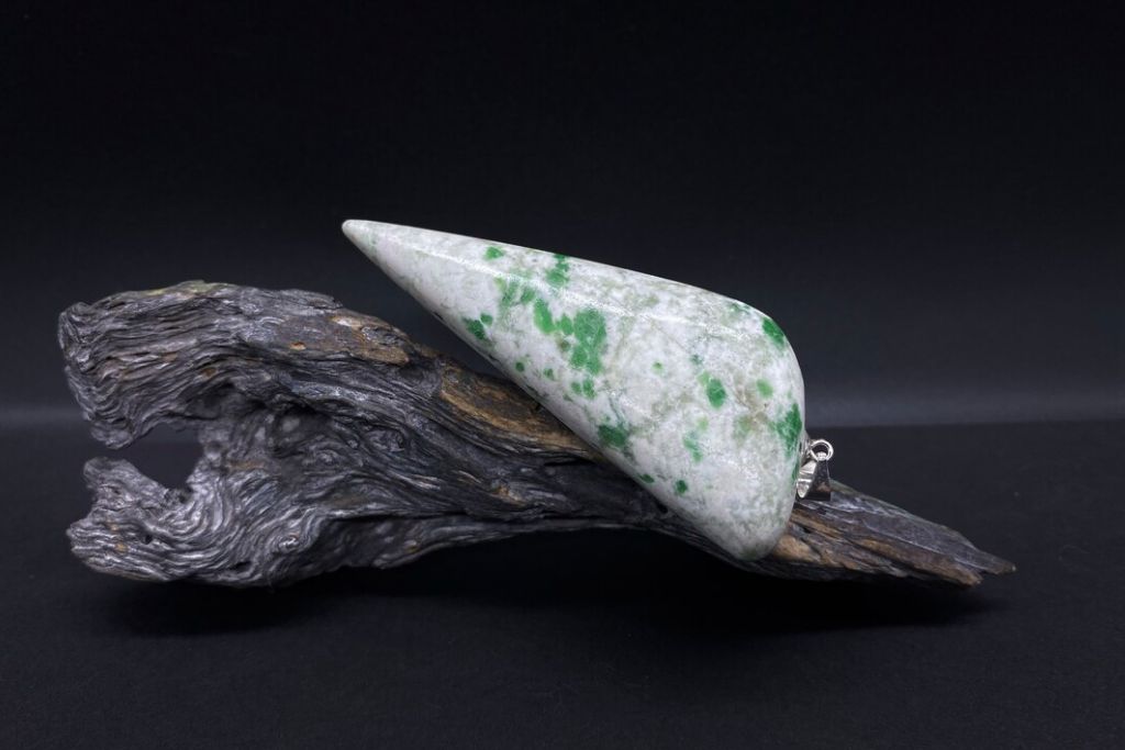 A Saussurit on a dried wood. Source: Etsy | Steinartig