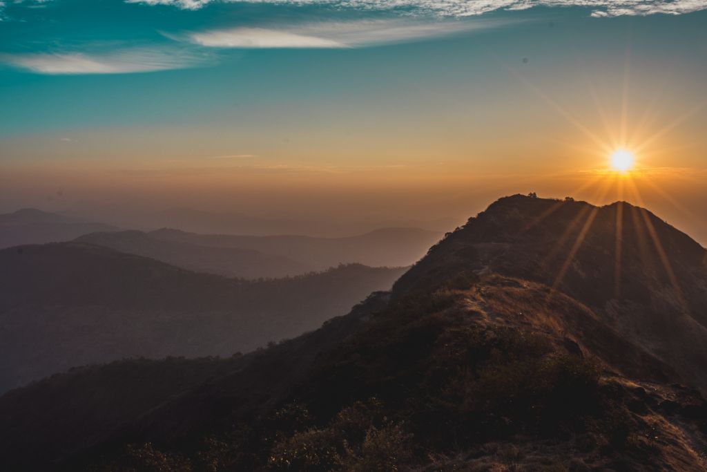 A view of the sunrise at the mountains