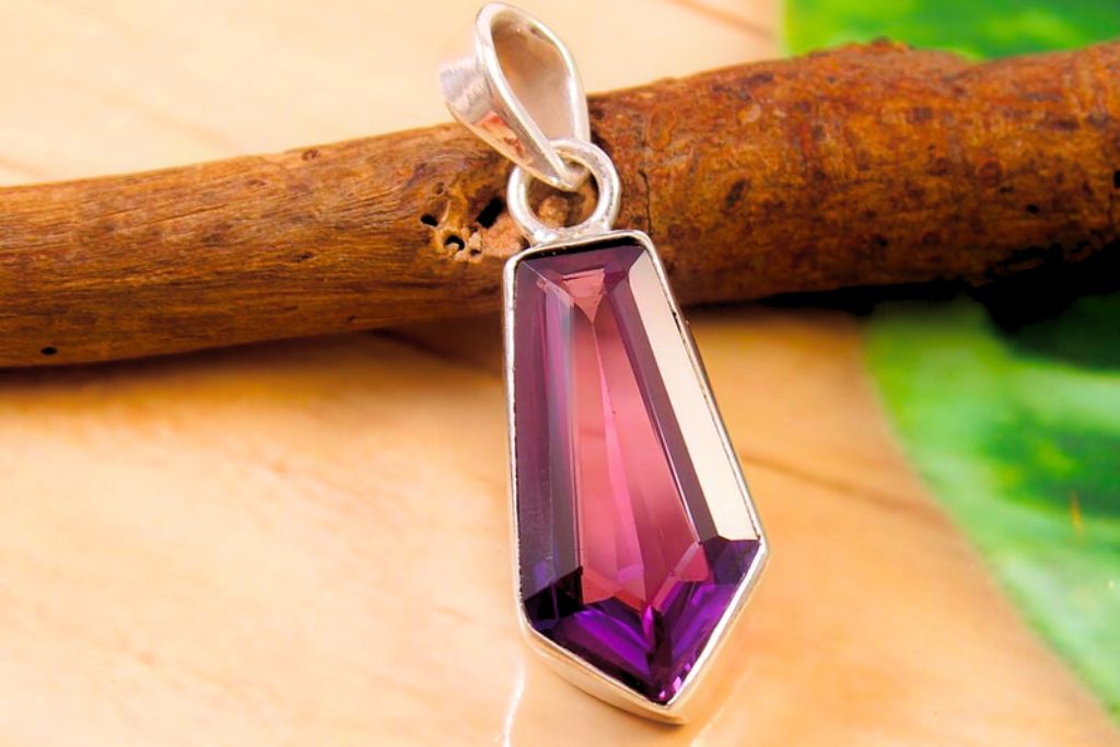 Taaffeite crystal built on a pendant necklace. Image Source: Etsy.com | SapphireGemsJewels