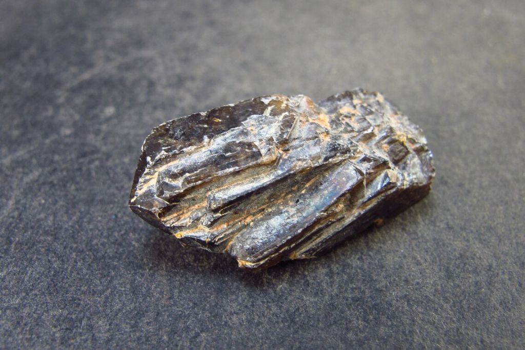 A Xenotime crystal on a table. Source: Etsy | TheGlobalStone