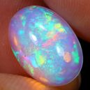 a hand holding a Welo opal