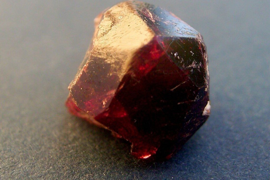 Almandine crystal on a table