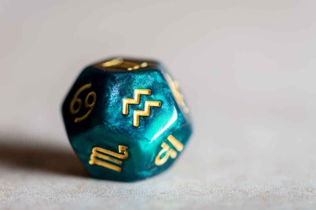 Aquarius dice on white background
