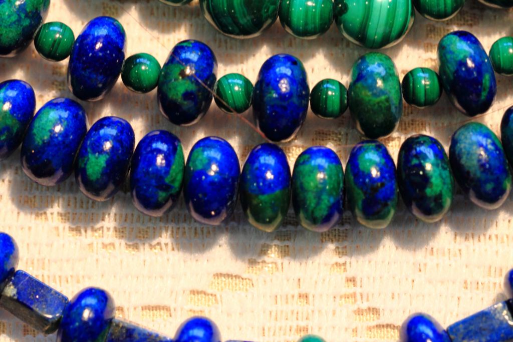 azure malachite beads formed a necklace