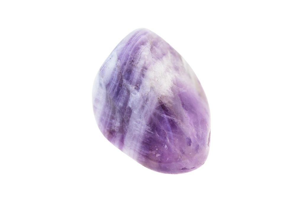 Amethyst crystal on a white background