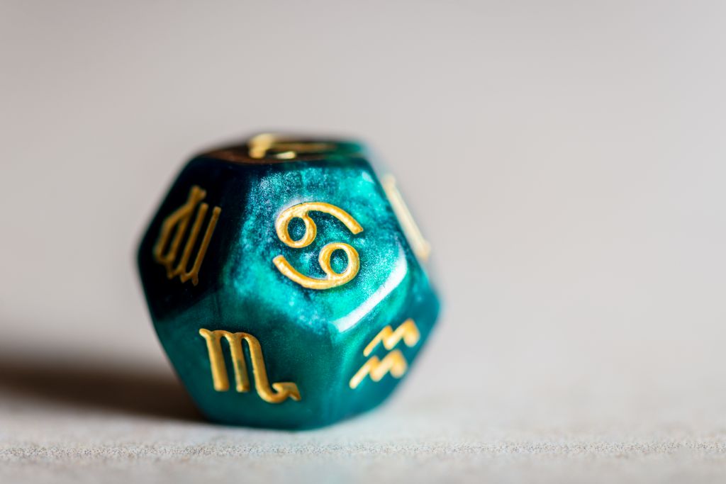 cancer dice on a white background