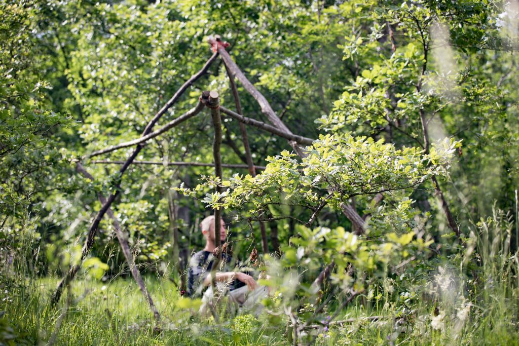 a man meditating in a merkaba structure depicting merkaba activation