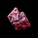 Red Spinel on dark background