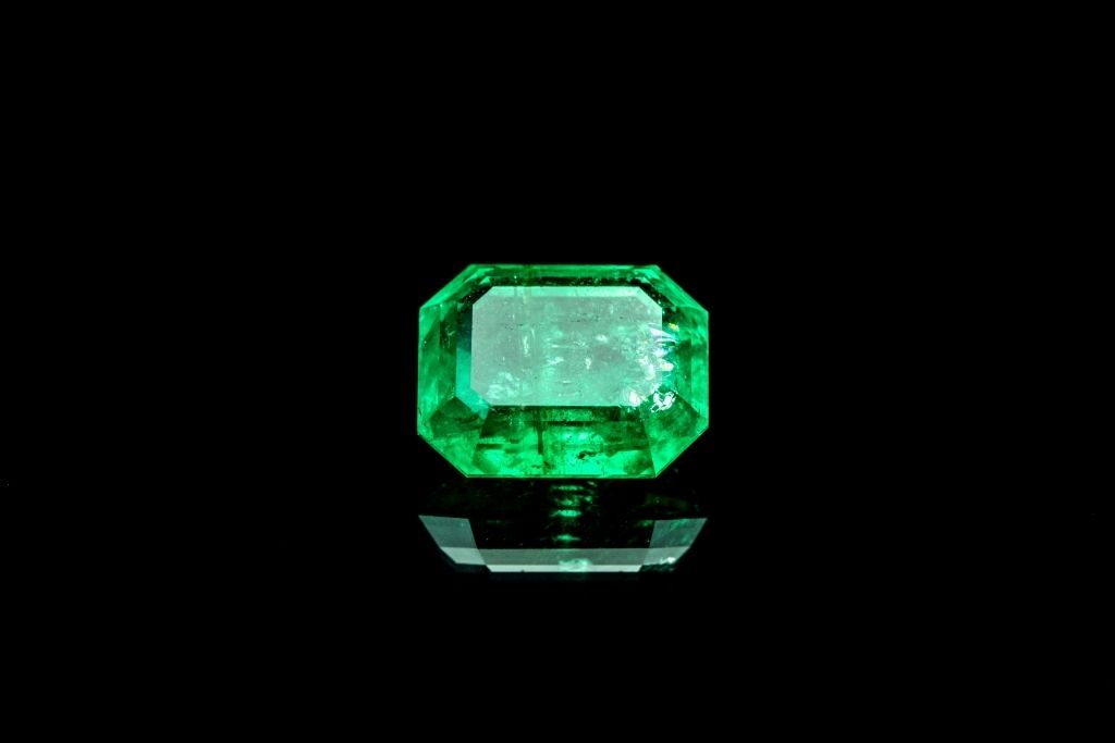 biron emerald on black background