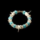 bone turquoise bracelet on dark background x no credit needed