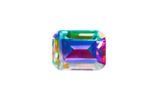 faceted azotic topaz on white background