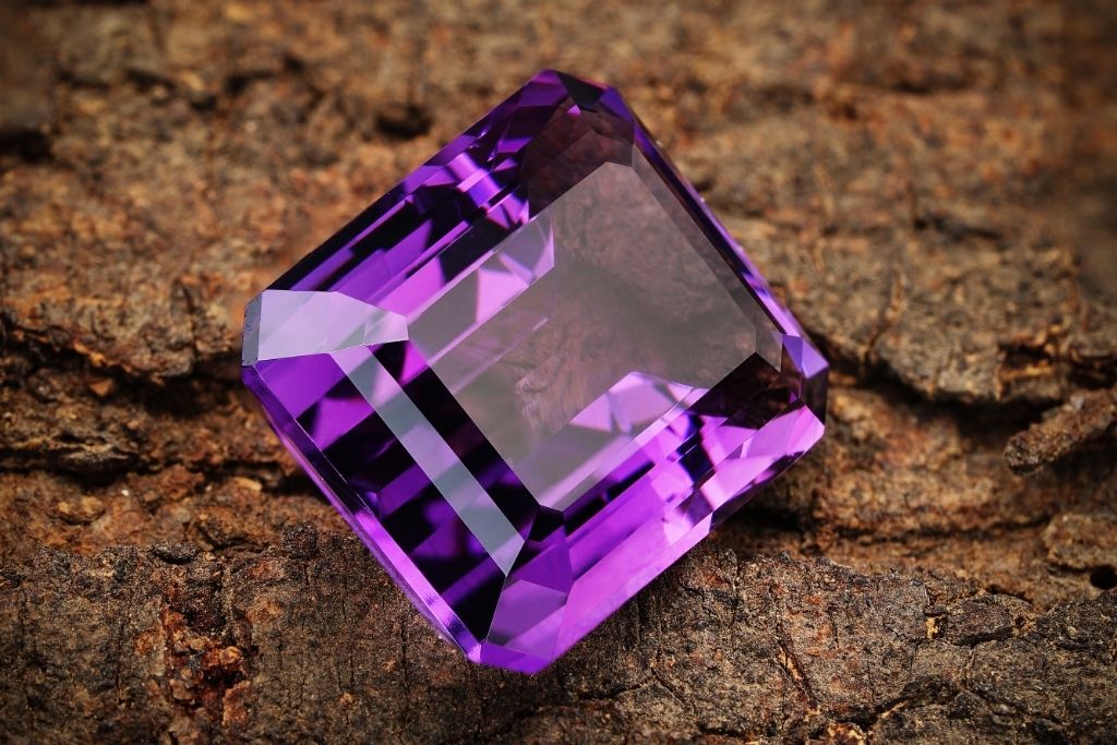 purple sapphire on the ground