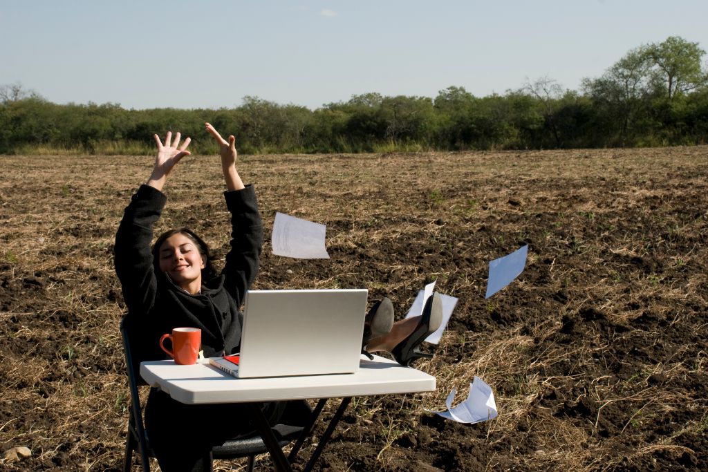 a girl throwing away papers depicting stress relief