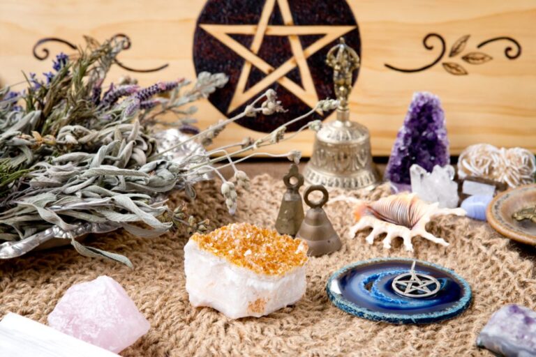 Crystal altar with herbs and crystals.