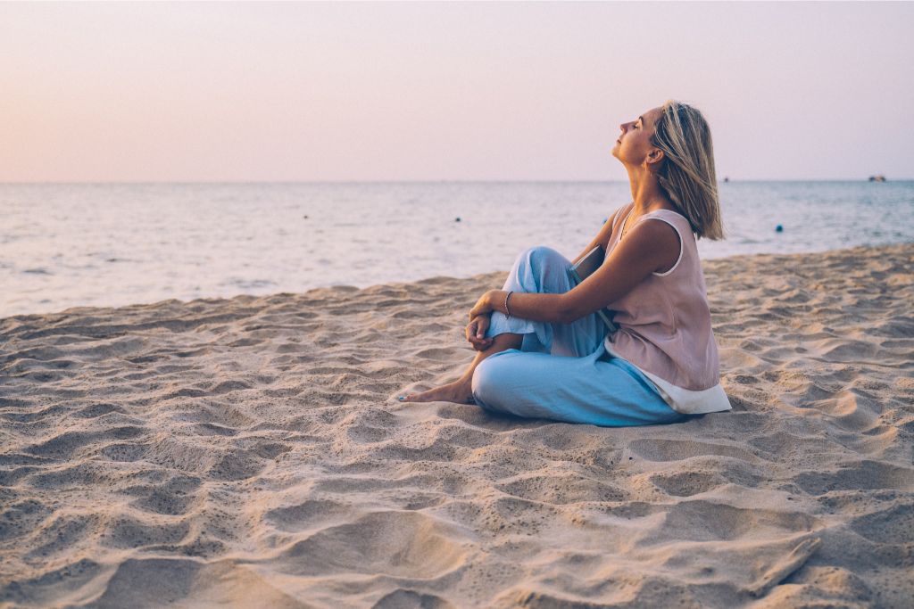 A woman on the side of the beach