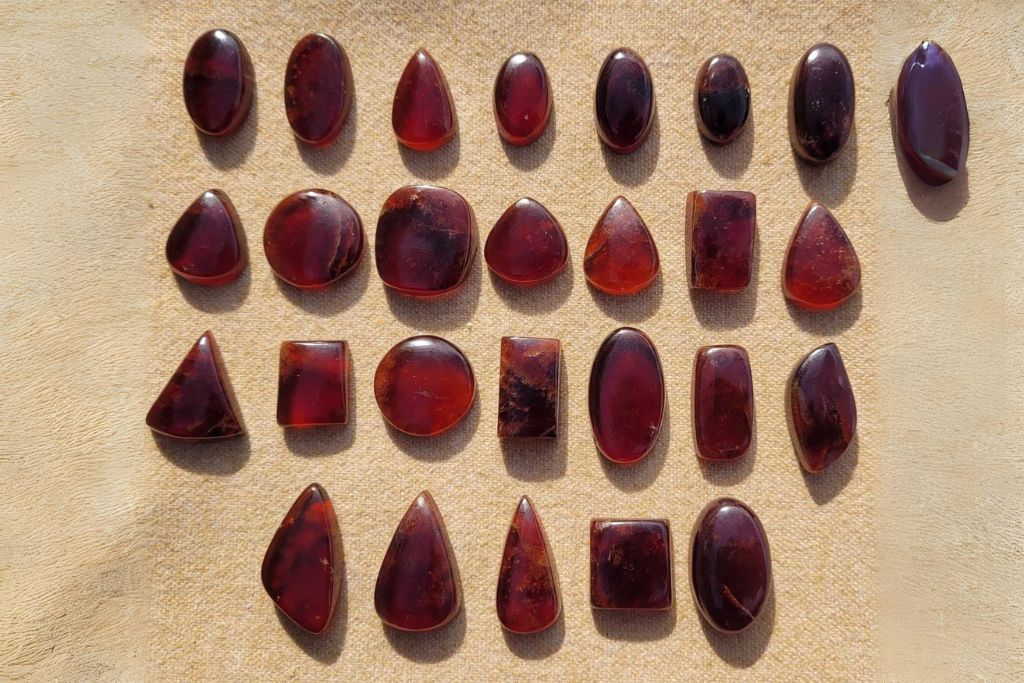 Mozambique Garnet on sand 