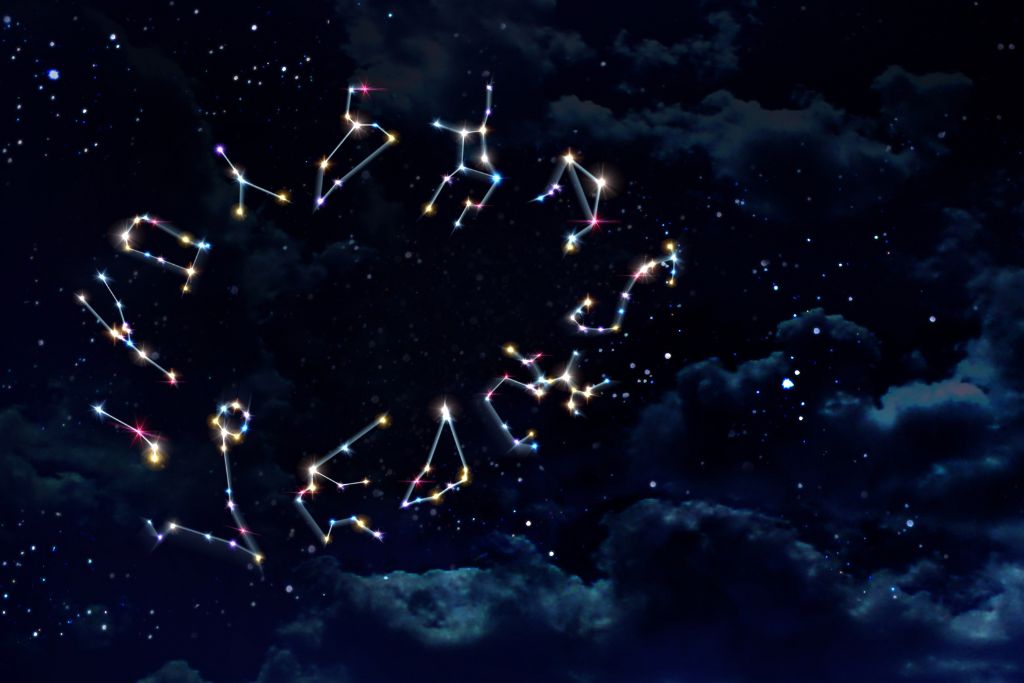 Zodiac constellations with a black starry night background