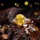 canary diamond on brown rocky surface