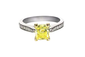 canary diamond ring on white background