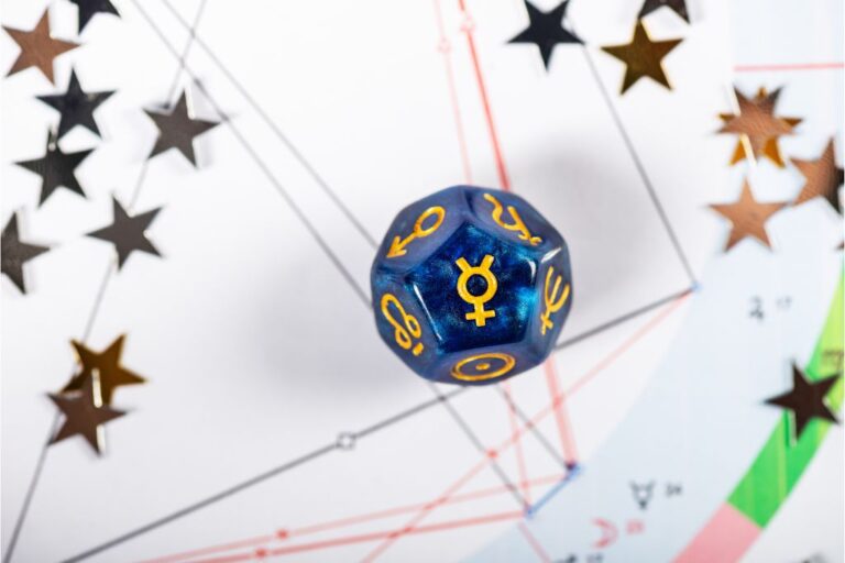 blue dice with the symbol of mercury on it