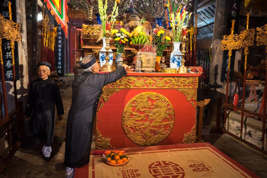 Festival Altar and two guys preparing