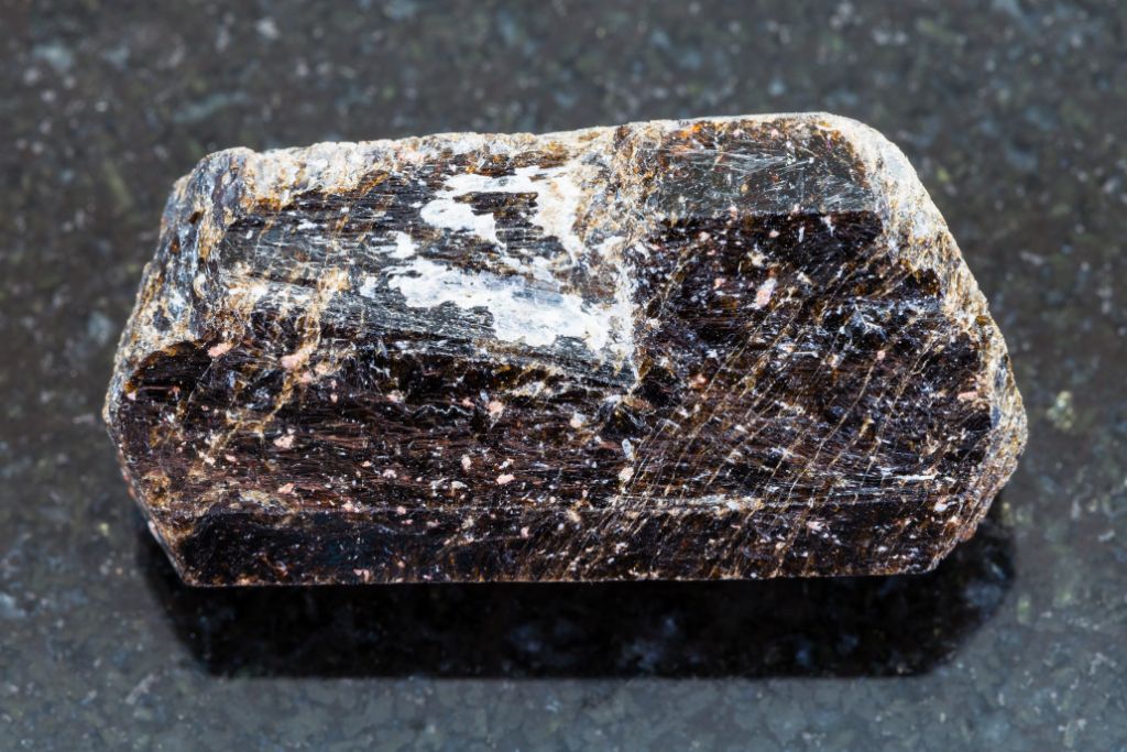 dravite chunk on granite platform