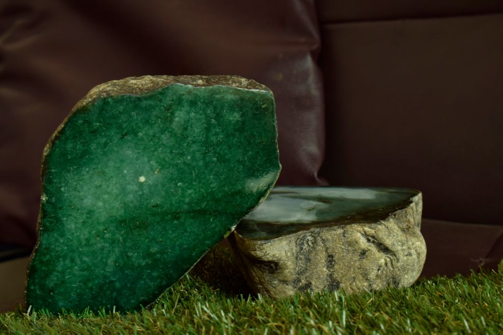 imperial jade chunk on on brown sofa