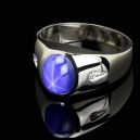 star sapphire ring with black background