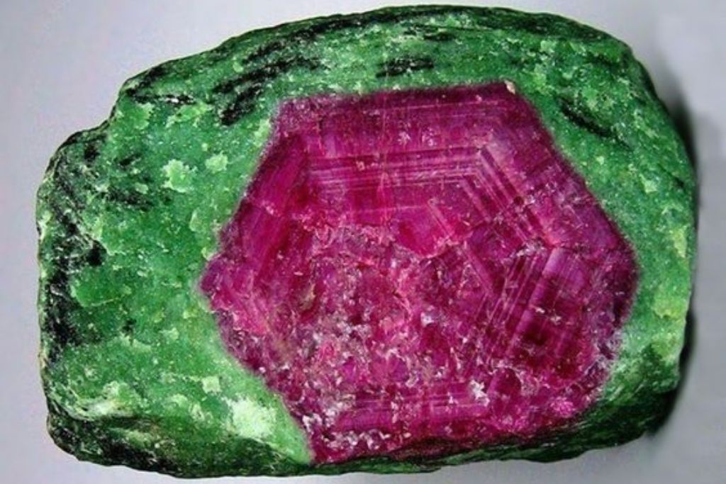 Hexagon Pattern Ruby fuschite on a platform