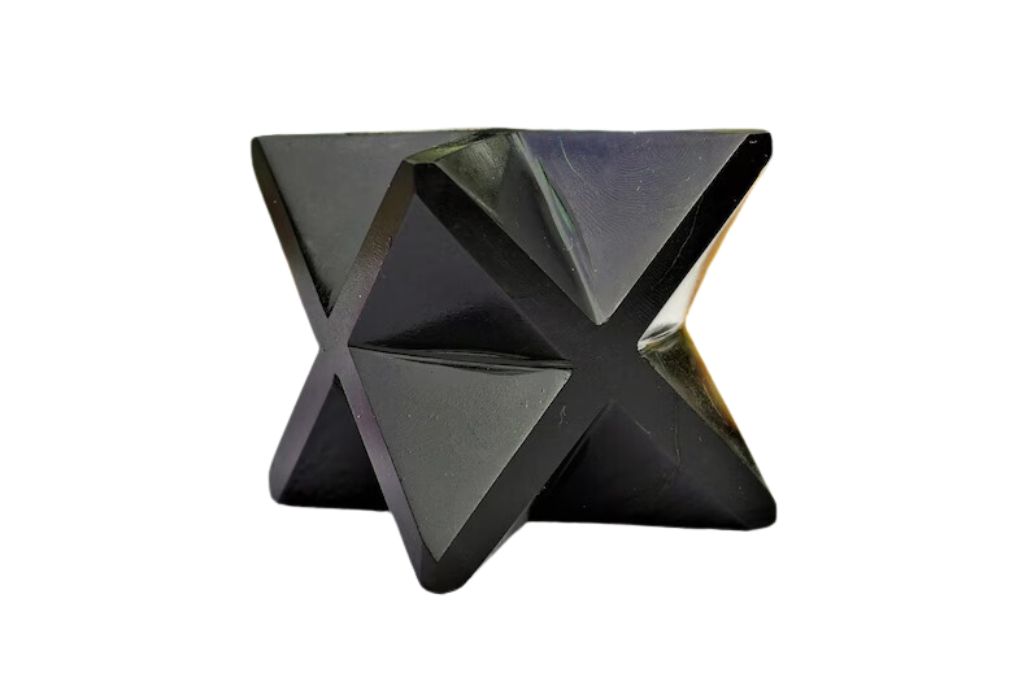 Merkaba shaped Black Tourmaline on a white background