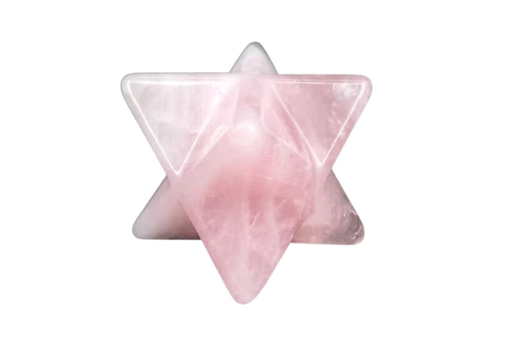 Merkaba shaped Rose Quartz on a white background