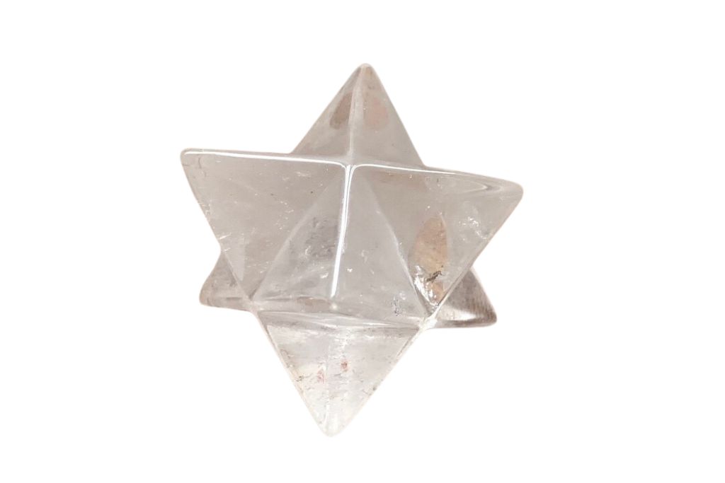 Merkaba shaped clear quartz on a white background